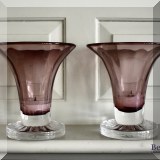 G06. Pair of violet glass candle holders. 